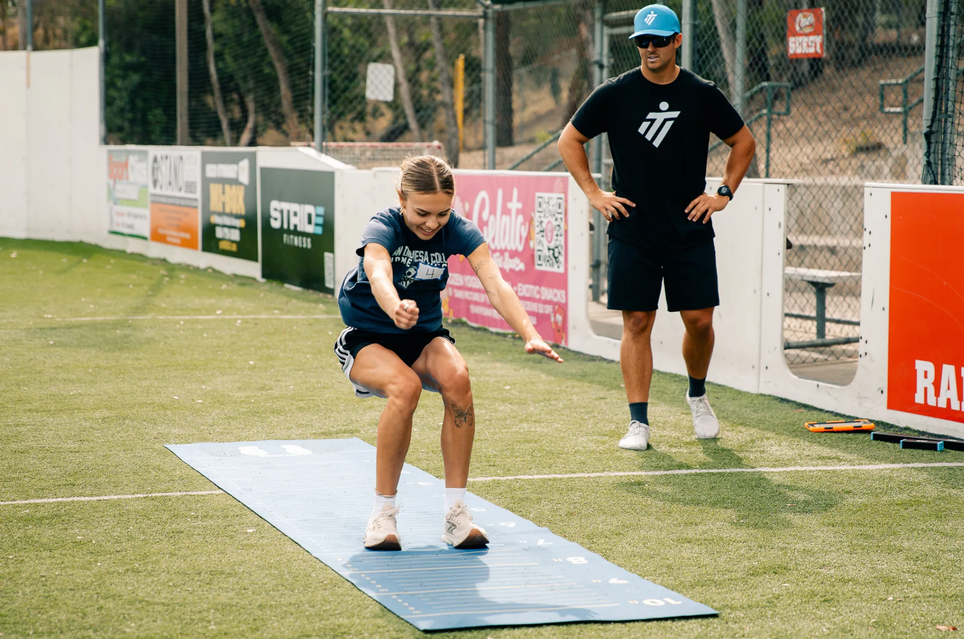 Athlete sprinting through a flying-10 speed test